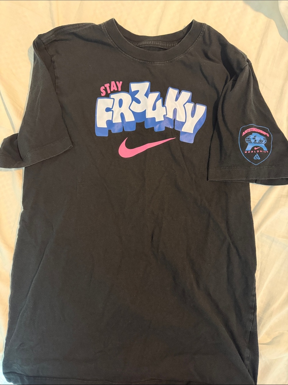 Nike Black Short-Sleeve Tee with Pink Swoosh and Blue-Purple Graphic